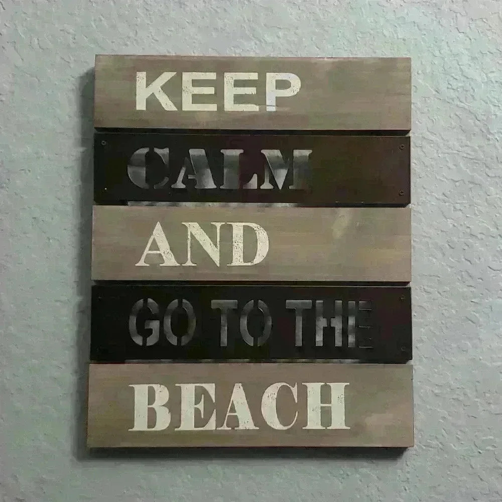 Metal and wood sign